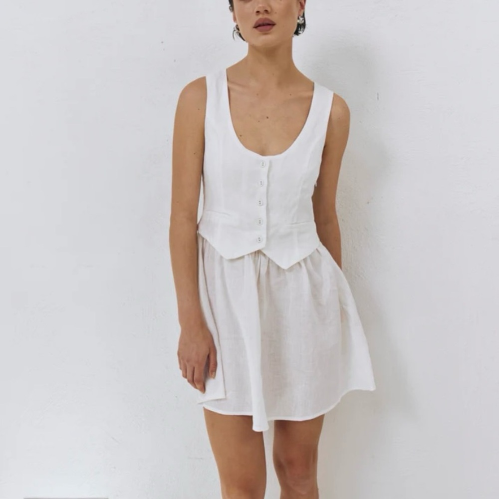 Sleeveless White Mini Dress with Button Front Bodice